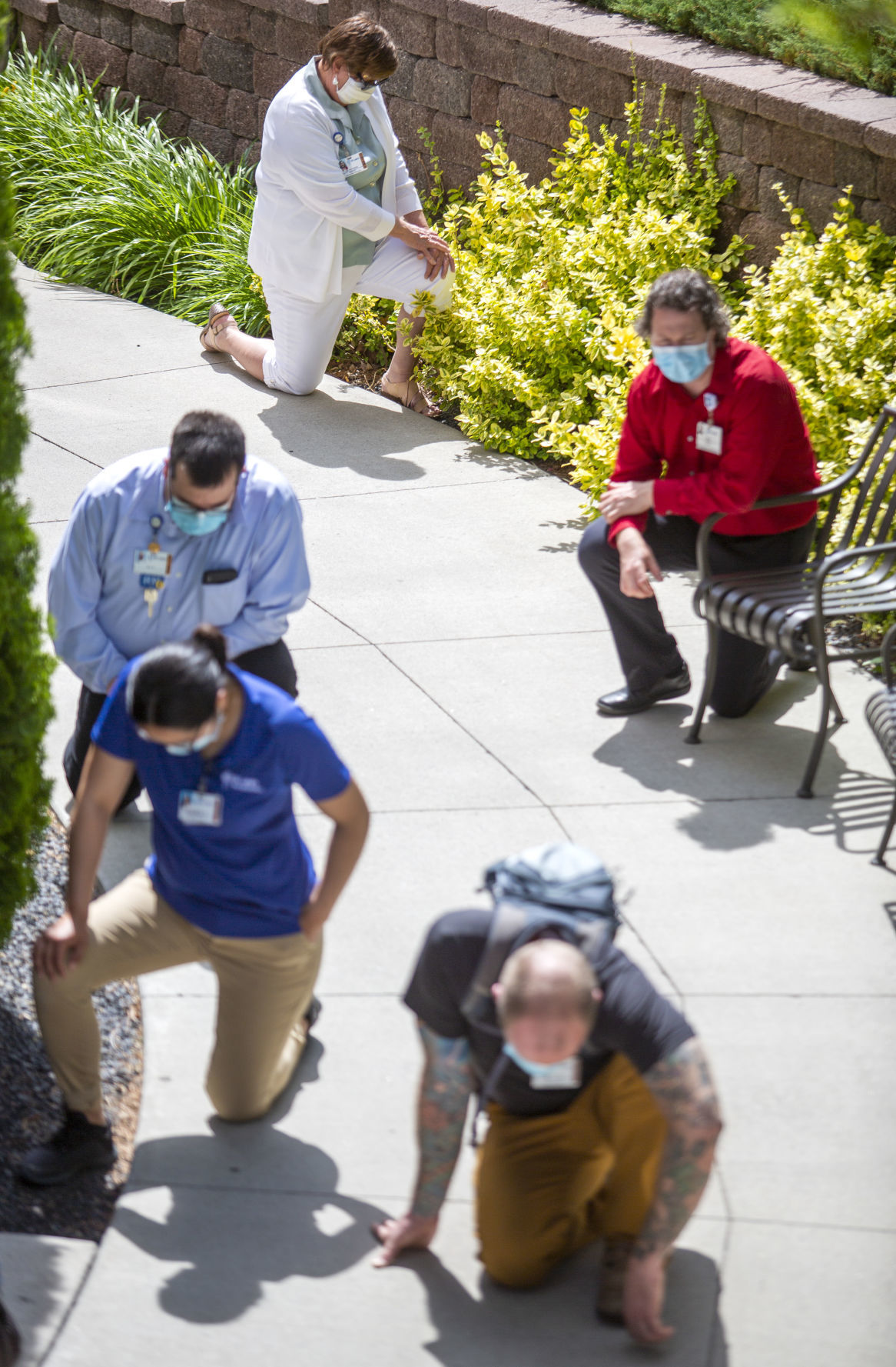 Hospital staff show solidarity with moment of silence